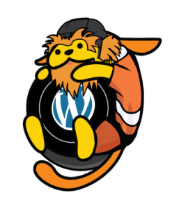 Gritpuu is Wapuu with orange hair and beard, an orange jersey, holding the WordPress logo
